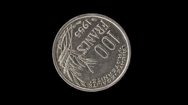 France 1955 100 francs coin reverse with fruit, wheat and olive branches rotating on black background