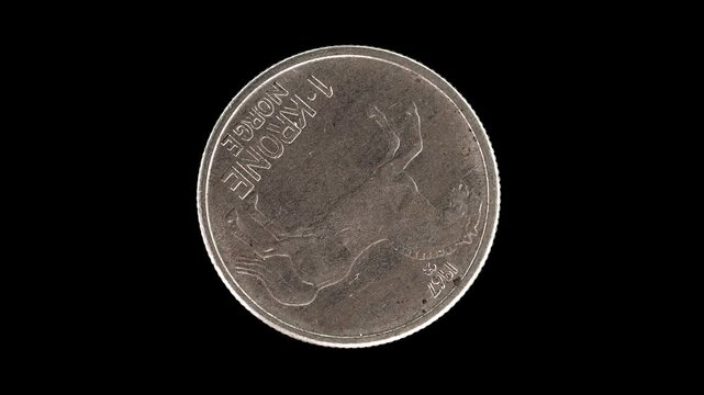 Norway 1967 1 krone coin reverse with horse facing left and denomination rotating on black background