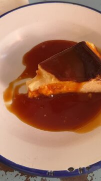 Enjoy a Delicious Flan Dessert Served with a Tasty Caramel Sauce for a Sweet Treat