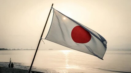 Japanese Flag Waving on Beach at Sunrise: Tranquil Scene - Powered by Adobe
