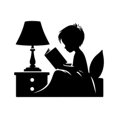 Child reading book in bed at night with lamp