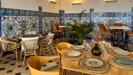 A serene Mediterranean cafe adorned with vibrant Moorish tiles, perfect for Fiesta Nacional de Espana or La Tomatina revelry
