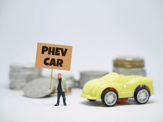 Mini toy of action figure and car at table with blurred background. Miniature diorama photography...
