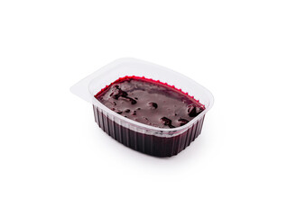 Rich berry jelly in a clear plastic container ready for serving
