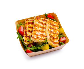 Grilled chicken salad with fresh vegetables on a white background