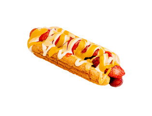 Delicious hot dog topped with sauce and served on a bun
