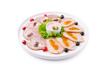 Gourmet platter of sliced meat and sauces displayed on a white serving dish