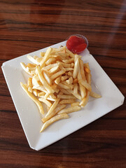 Delicious Classic French Fries on White Plate