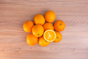 The Real orange  photographs taken with a high-resolution camera and stacking technique. on brown wooden background