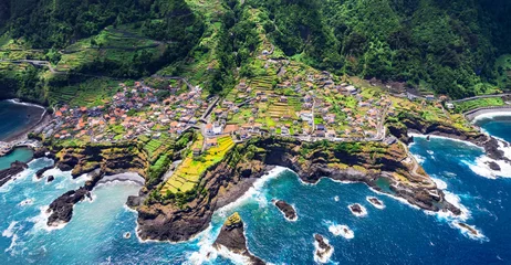 Fotobehang Madeira island beautiful nature scenic places. Stunning Seixal coast and village, aerial drone view of rocky coast and natural lava swimming pools. Portugal travel © Freesurf