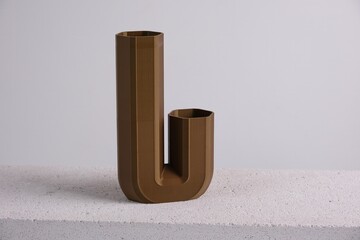 creative 3D printed brown curved vase home decor with a flowing geometric texture Decorative Vase...