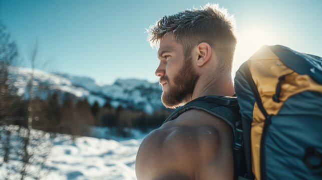 A rugged hiker stands amidst a stunning snowy mountain landscape, capturing the essence of adventure, resilience, and the breathtaking beauty of nature in winter.