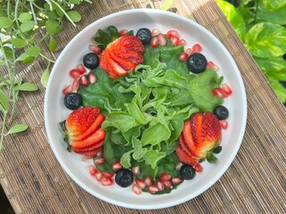 Crystal Ice Plant with strawberry, blue berry and pomegranate salad