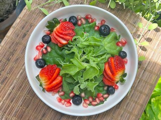 Crystal Ice Plant with strawberry, blue berry and pomegranate salad