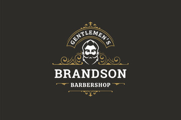 Classic barbershop logo featuring a vintage portrait of a male with beard, surrounded by elegant decorative elements. Retro design with gold accents and text for grooming services. Vector illustration