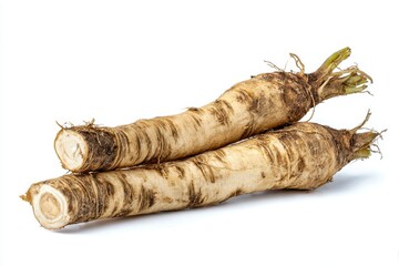 Obraz premium Horseradish roots displayed on a white backdrop