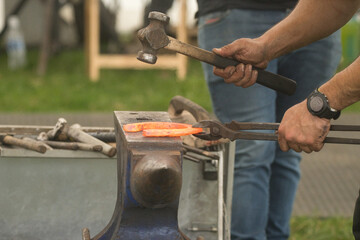 blacksmith working with hammer