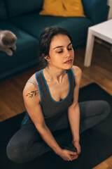 Woman Practicing A Yoga Routine