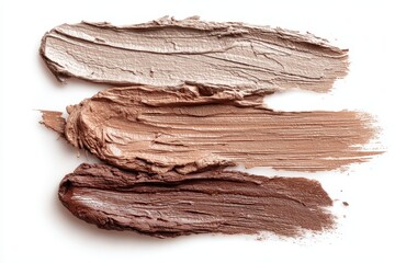 Streaks of cosmetic clay on a white backdrop