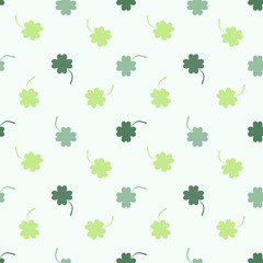 lucky leaves seamless pattern on green pastel background 