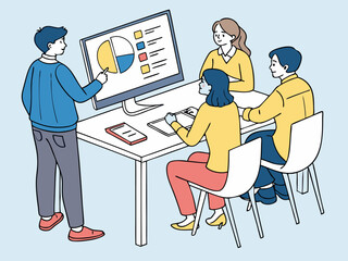 Business meeting with coworkers discussing data visualization on screen in contemporary workplace