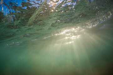 View of sunlight under the ocean surface.