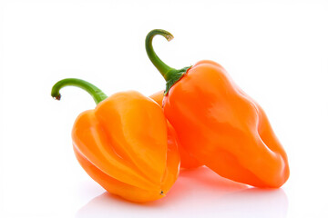 Two fresh orange habanero peppers isolated on white