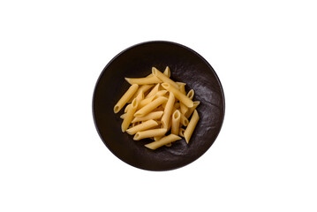 Penne pasta cooked with cheese, salt and spices. Italian food penne pasta