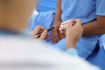 Doctor gives medication advice to a male patient with symptoms of sexual dysfunction, Male health...