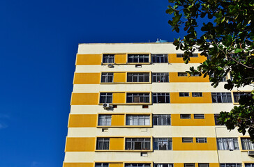 Residential building facade in Maracana neighborhood and blue sky, Rio de Janeiro, Brazil