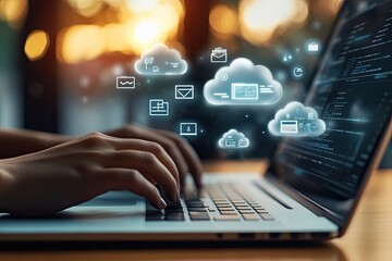 Close-up of hands typing on a laptop, with cloud computing icons