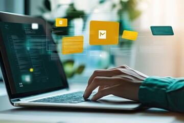 Person using laptop with digital elements