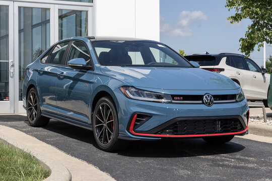 Volkswagen Jetta GLI Compact Sedan display at a dealership. VW offers the Jetta with a 2.0L Turbo 4-Cylinder engine. MY:2025