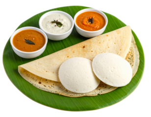 Angled View of Traditional South Indian Ghee Roast Dosa with Idlis and Chutneys on Banana Leaf Plate, Isolated on Transparent Background