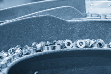 The vibration blow feeder operation with metal bush parts.