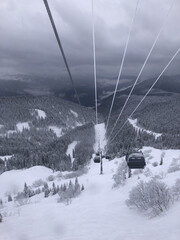 Snowy Mountain Slope View from Ski Lift in Winter