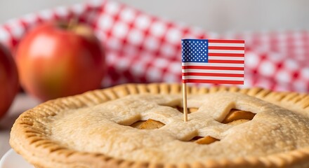 Patriotic American apple pie with a USA flag, a traditional dessert for celebrating the 4th of July, Memorial Day, or Labor Day on a rustic background with apples.