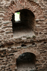 Obraz premium Interior of Ram Fortress with arched stone openings and medieval architecture in Serbia. Close view of details