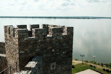 View of the Danube River behind a medieval watchtower at Ram Fortress in Serbia