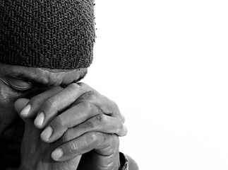 man praying to God Caribbean man praying with background stock image stock photo	