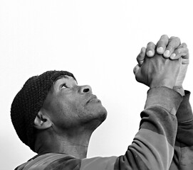 man praying to God Caribbean man praying with background stock image stock photo	