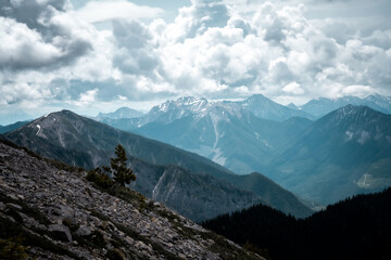mountain scape with cloudy skies above