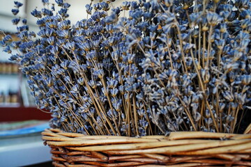 Dried lavender bouquet in a woven basket. Rustic floral arrangement for home decor, aromatherapy,...