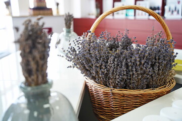 Dried lavender bouquet in a woven basket. Rustic floral arrangement for home decor, aromatherapy,...