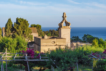 The Carthusian Charterhouse of St. James, Certosa di San Giacomo before vibrant greenery and...