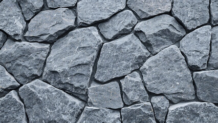 Obraz premium Gray stone wall background with rough texture and pattern
