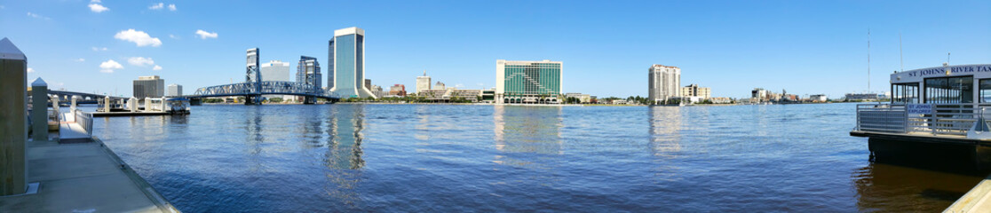 Cityscape of Jacksonville, Florida. Downtown bridge and waterfront. Panoramic shot.