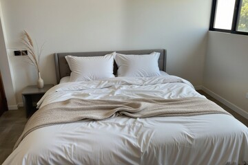 Cozy Modern Bedroom with Soft Bedding and Natural Light Accent