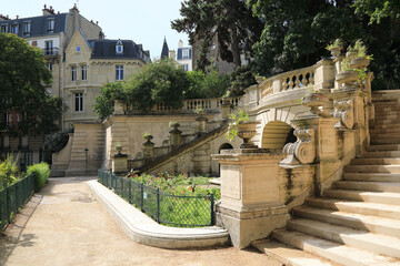 Old monumental staircase in a parisian park
