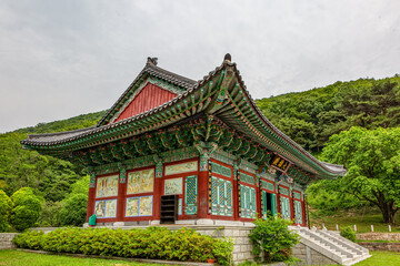 Korean traditional temple with Buddhist wooden buildings, traditional patterns of dancheong and roof tiles